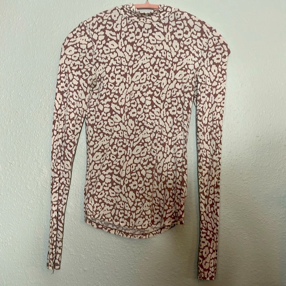 Cheetah Print Free People turtle neck.